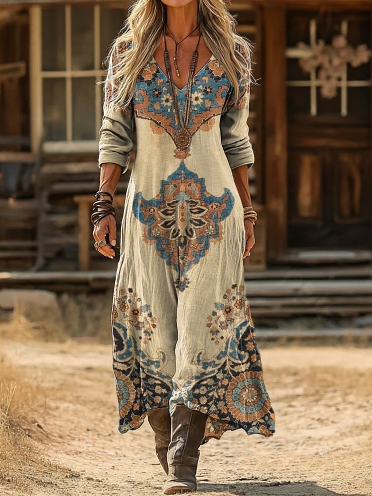 Amberley paisley maxi dress in cream, blue and rust, outdoor walking view