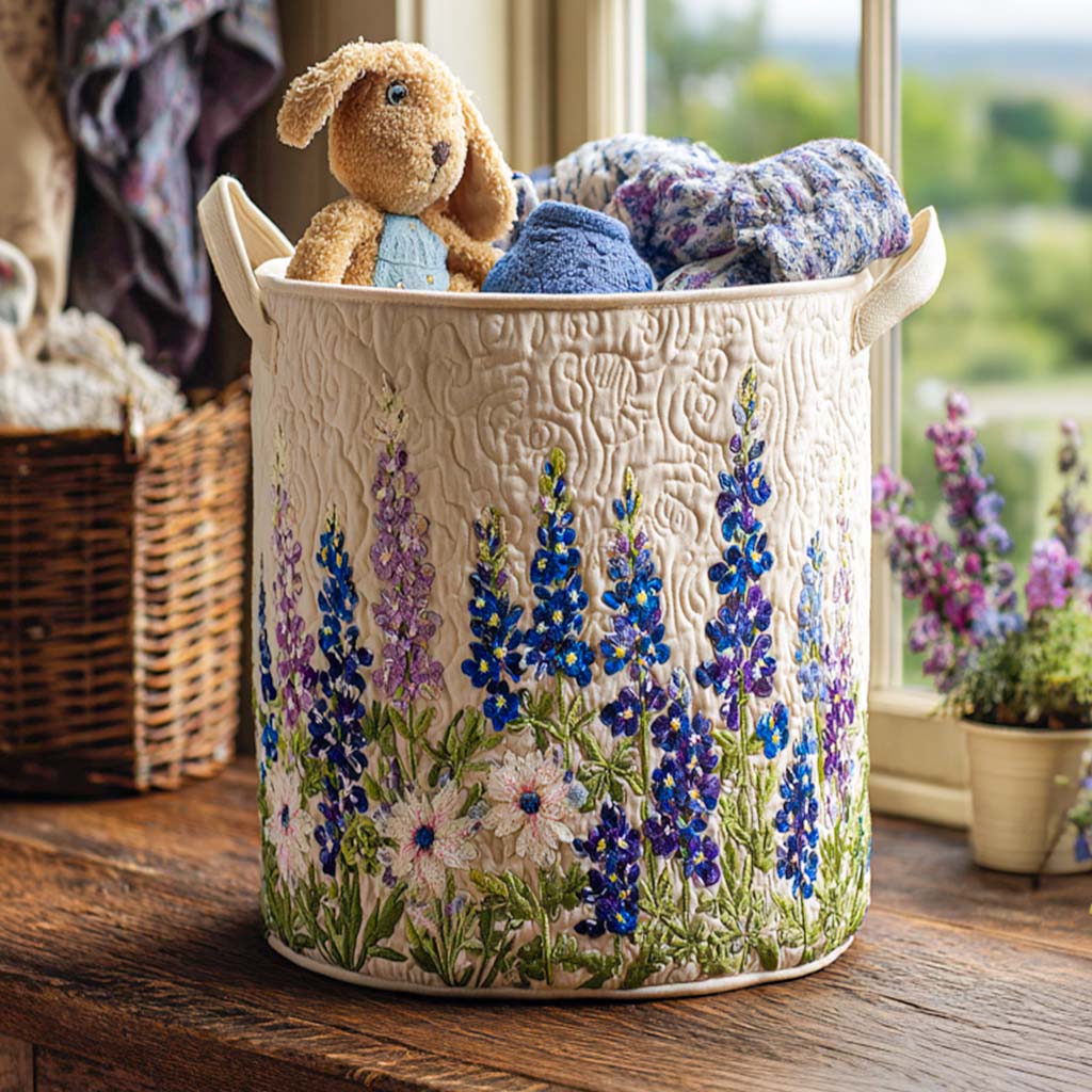 Elena hand-quilted laundry basket with blue lupins and white wildflowers on cream, front view