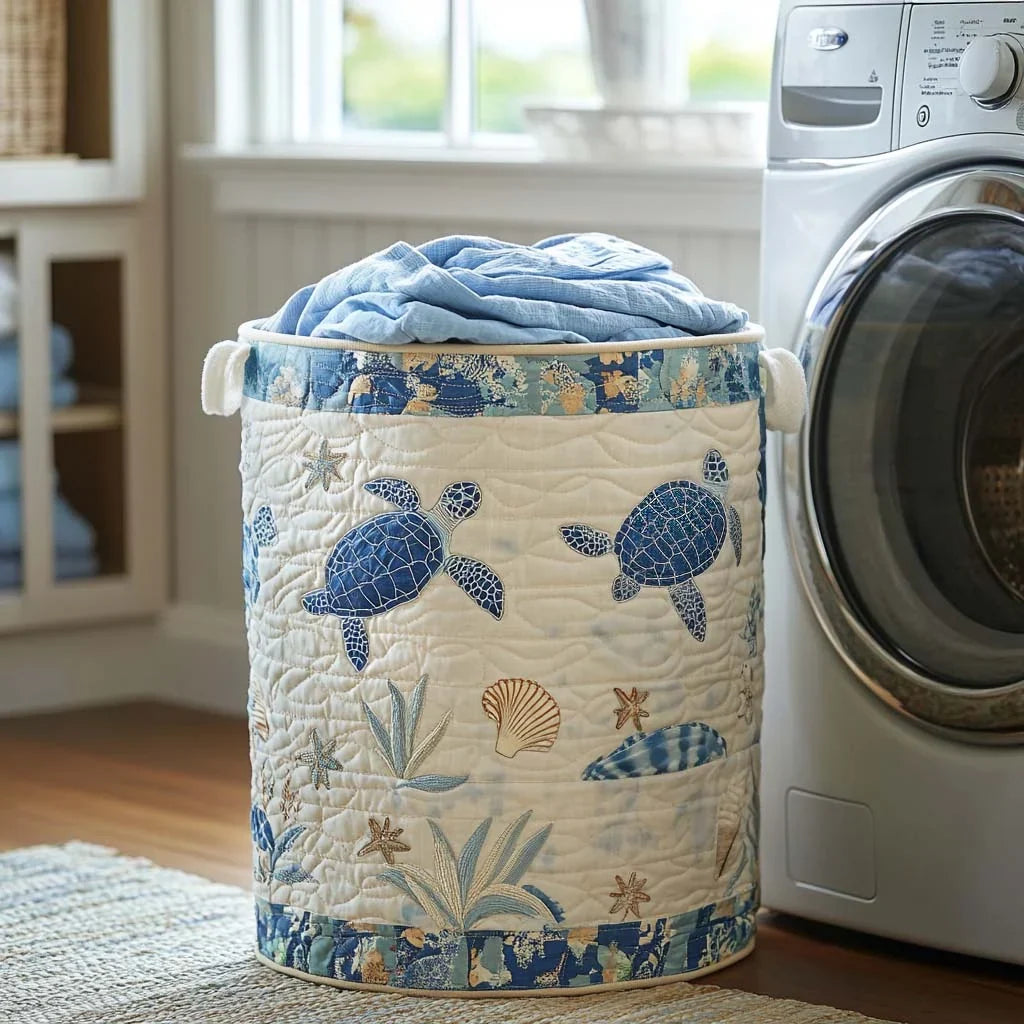 Consolata hand-quilted laundry basket with blue sea turtles and seashells, front view