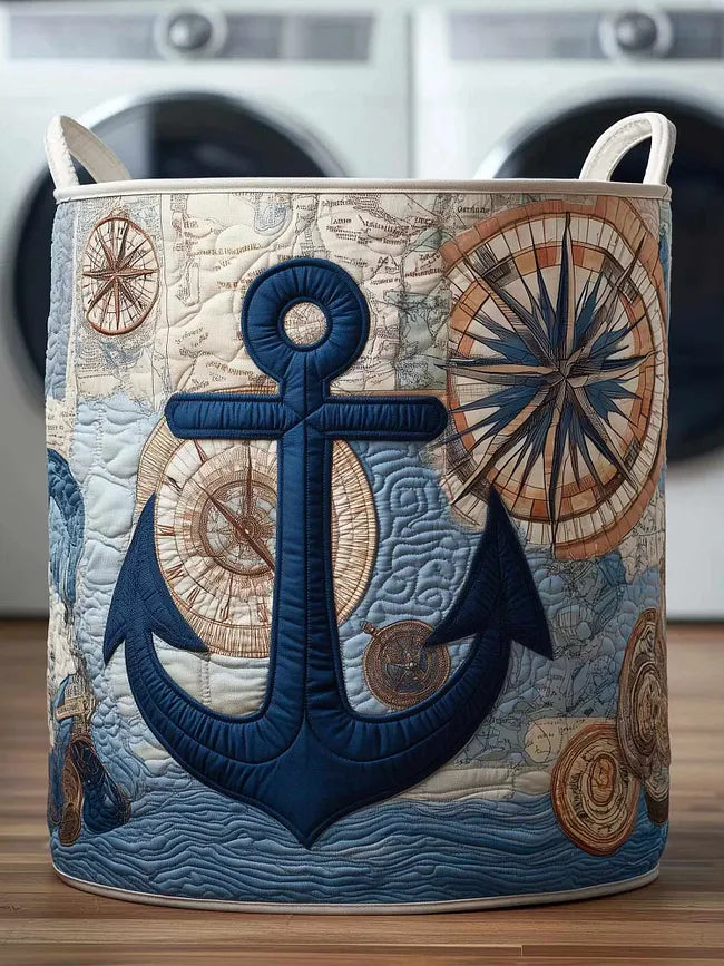 Adriana hand-quilted laundry basket with a navy anchor and compass roses, front view