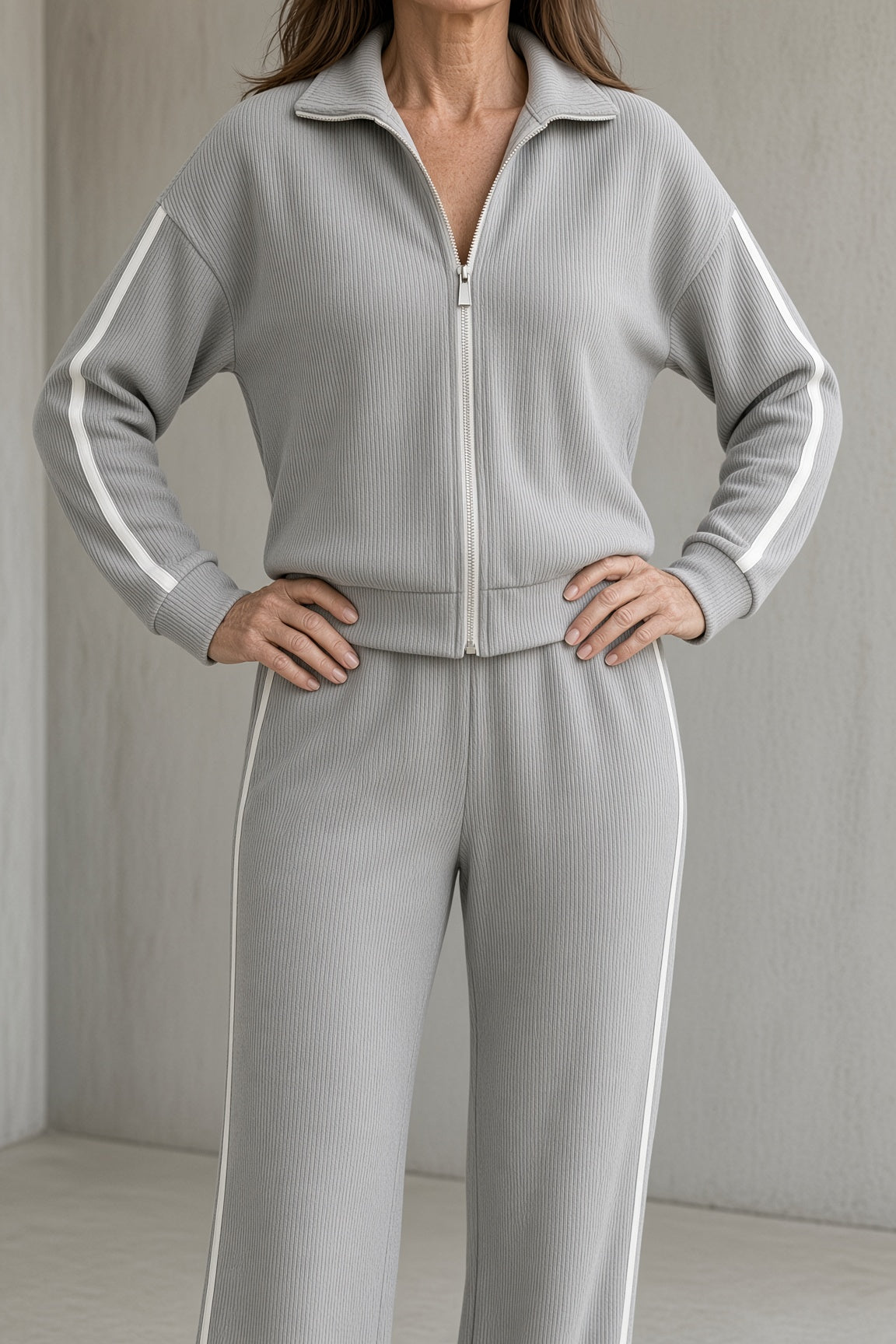 Ilsa zip-up top and striped wide-leg trouser set in grey, close-up view