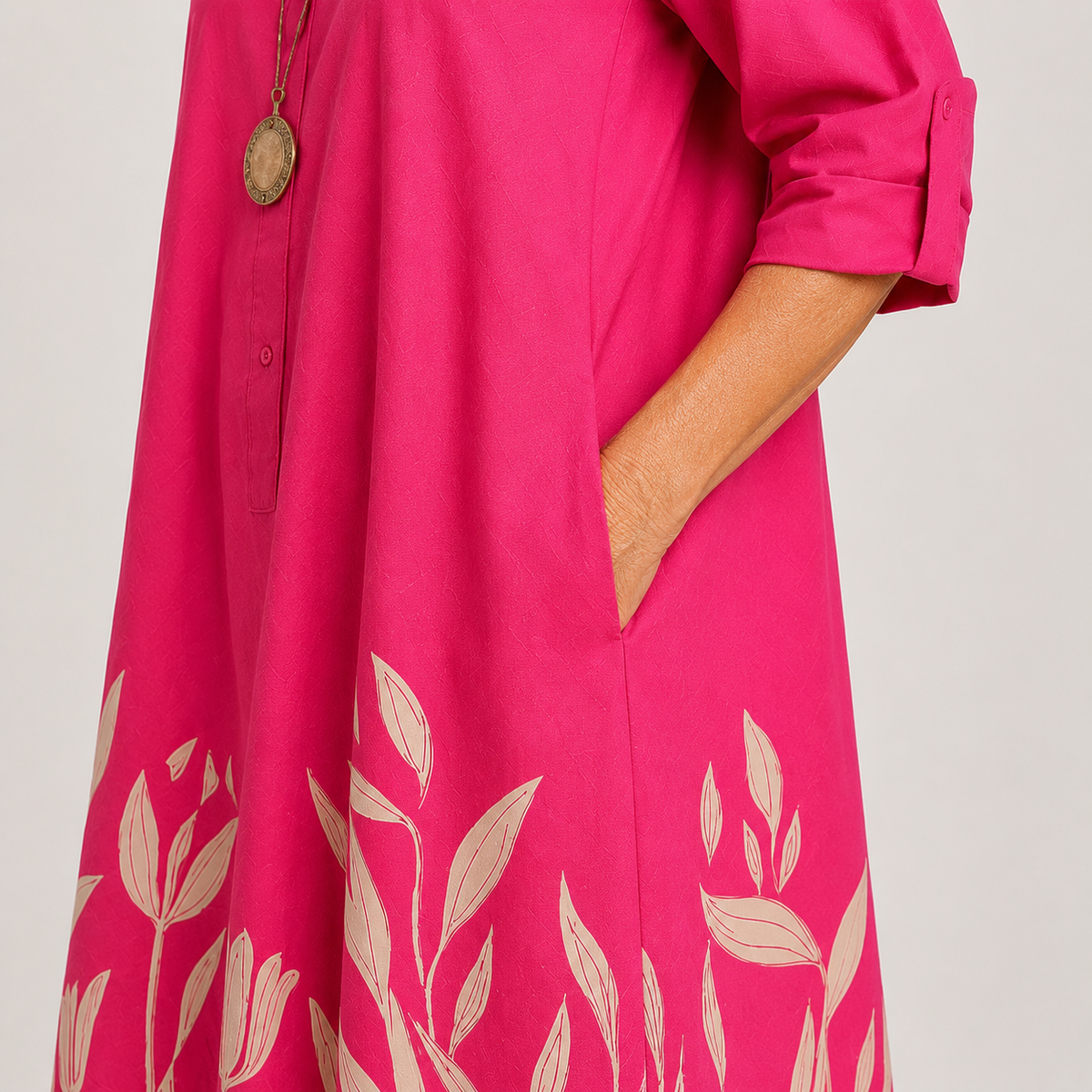 Annemarie leaf-print shirt dress in pink, close-up of side pocket and leaf-print hem