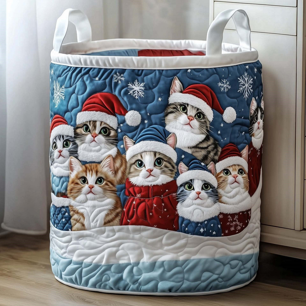 Graziella hand-quilted laundry basket with rows of kittens in Santa hats and festive jumpers, front view
