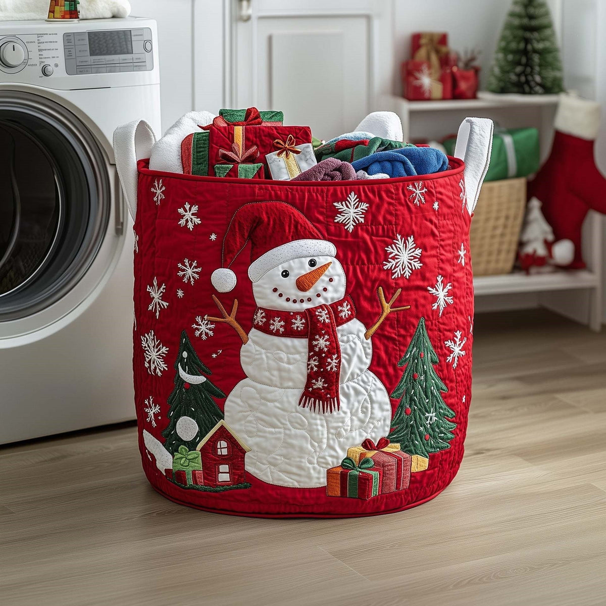 Enrica hand-quilted laundry basket with a snowman and snowflakes on festive red, front view