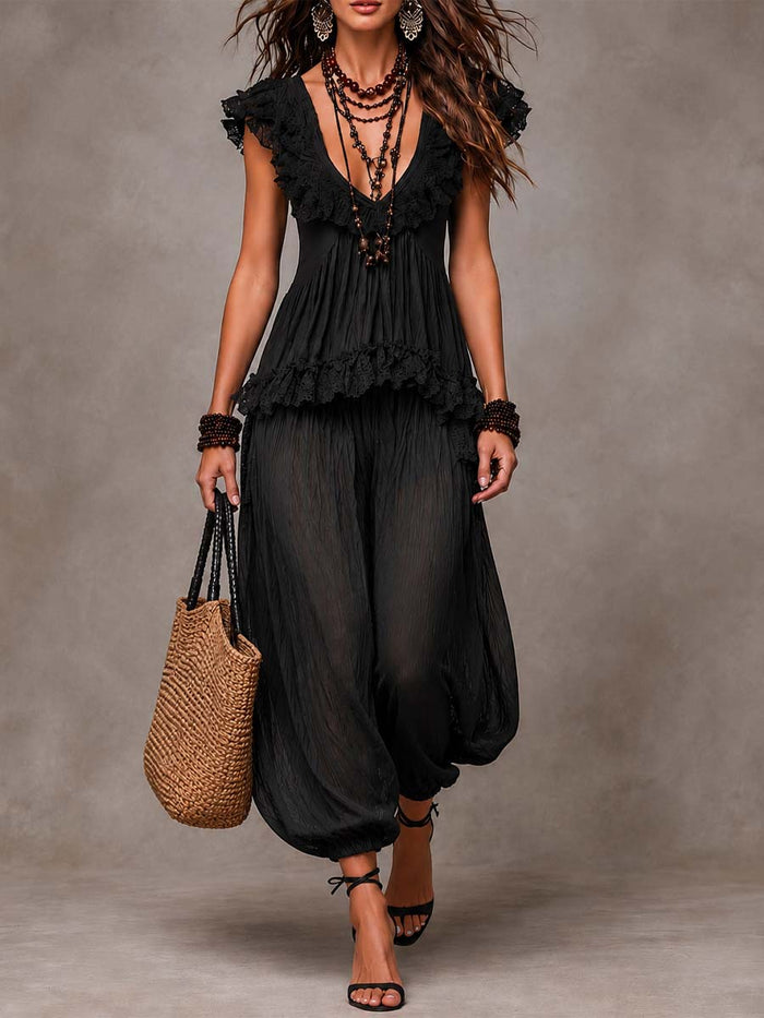 Black bohemian three-piece set with lace V-neck top and harem trousers, full front view