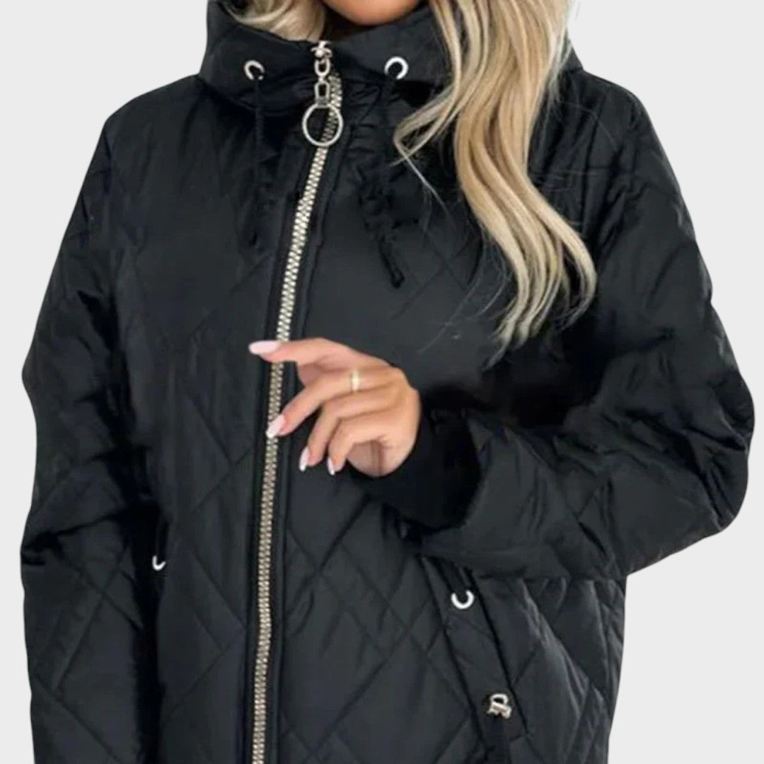 Esther diamond-quilted hooded jacket in black, close-up of quilting and zip