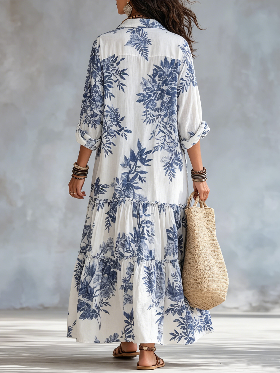 Heidi long blue floral dress in white and blue, full-length back view with tiered skirt