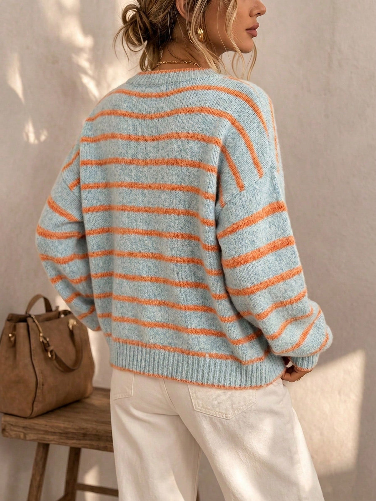 Chelsea striped button cardigan in blue and orange, back view