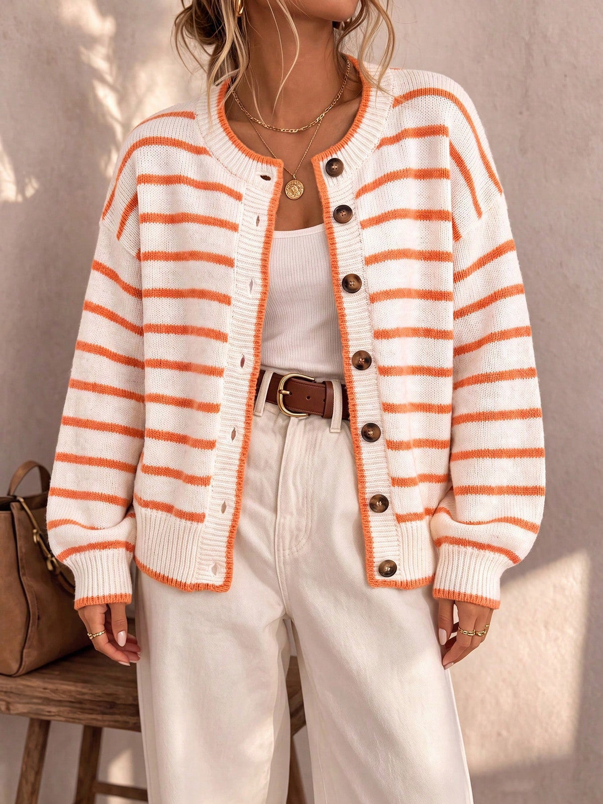 Chelsea striped button cardigan in white and orange, front view