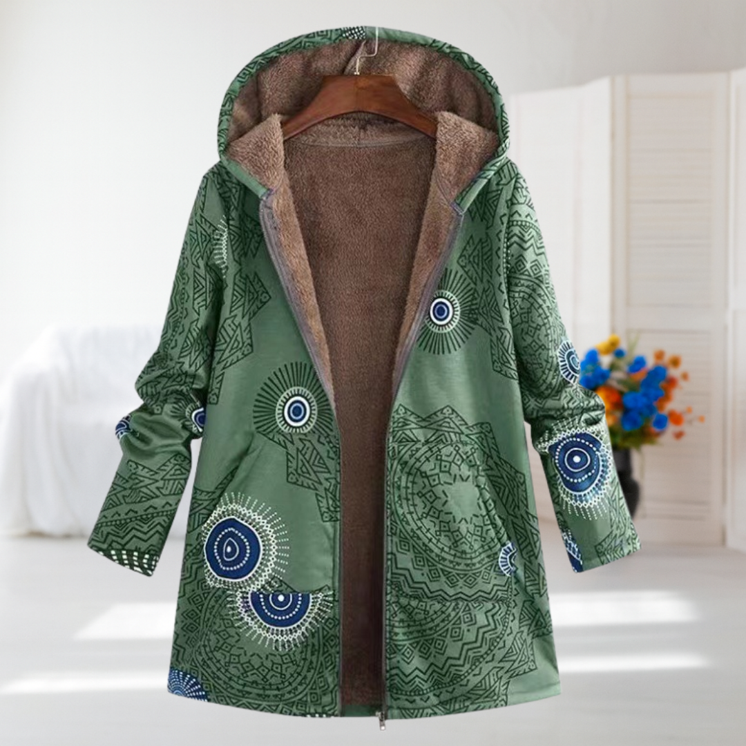 Alma mandala print hooded coat in green, front view on a hanger