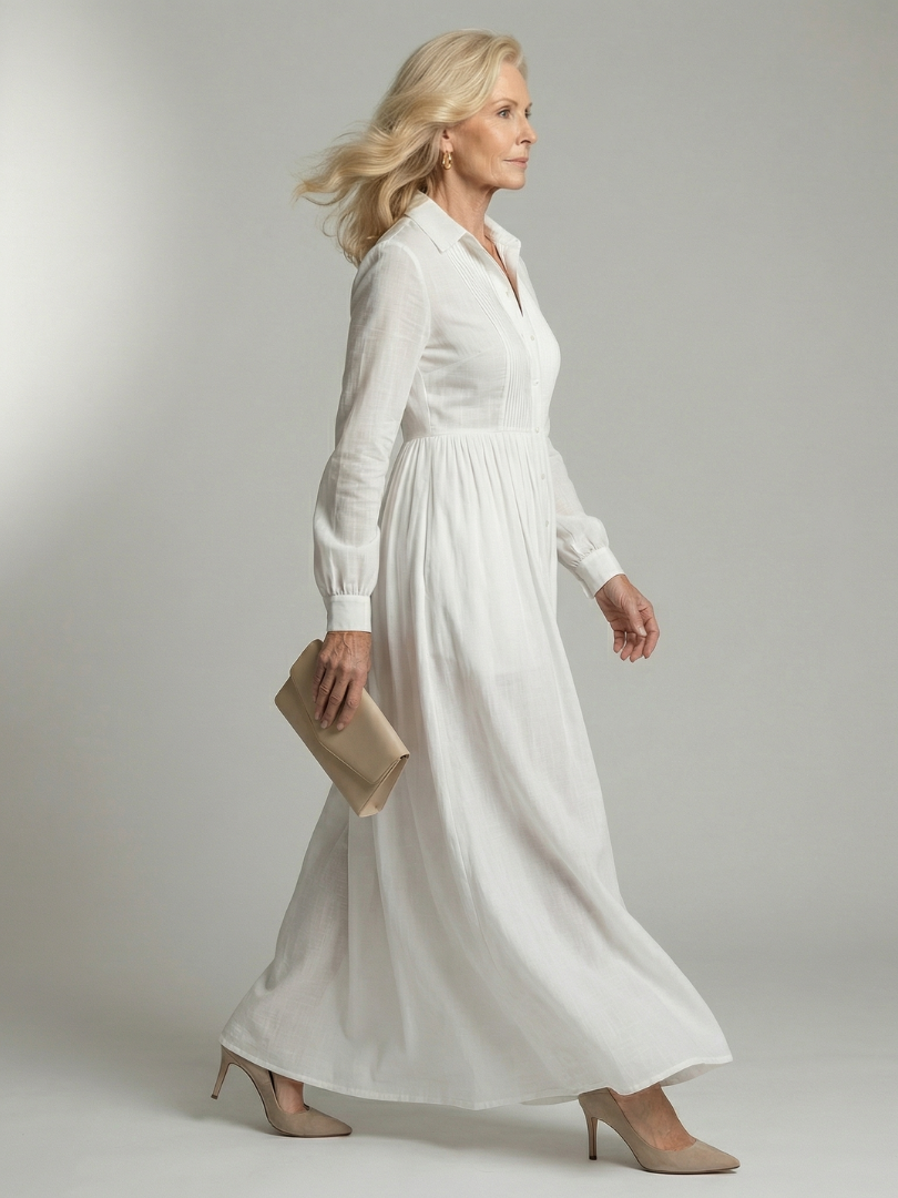 Greer pintucked maxi shirt dress in white, side view walking