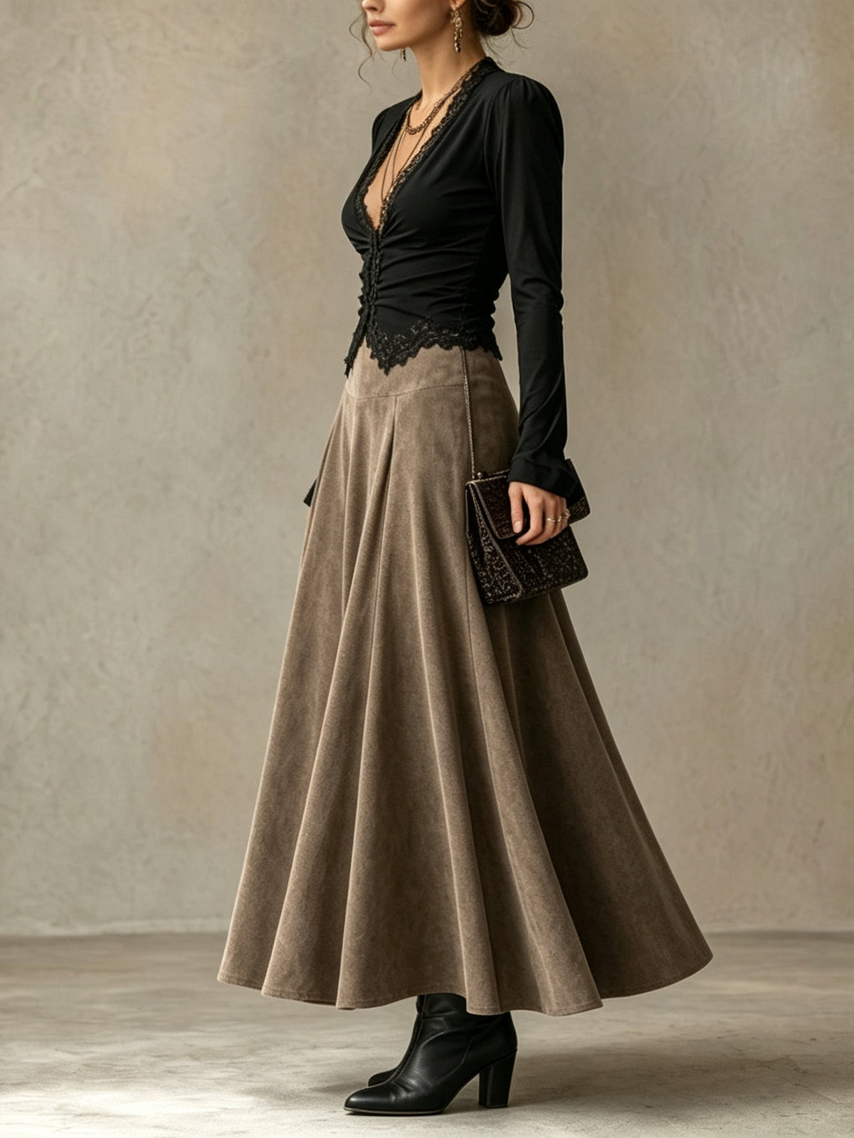 Diantha lace top and skirt set in black and taupe, side view
