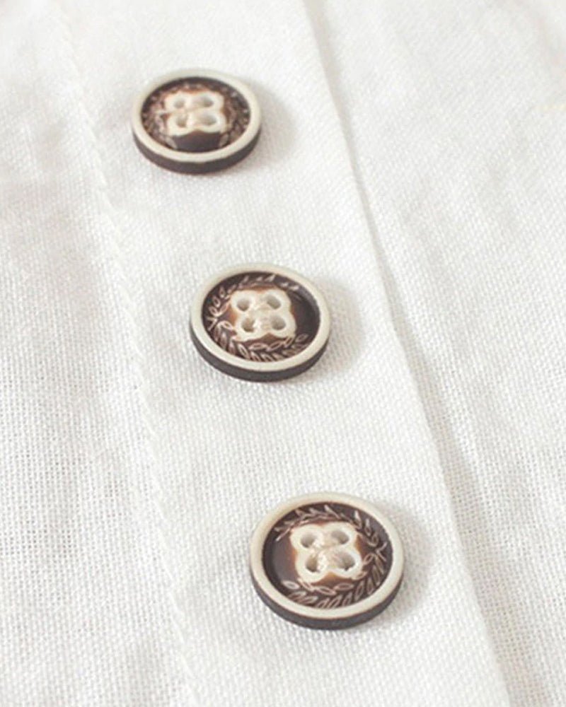 Miranda linen-look T-shirt in white, close-up of decorative buttons
