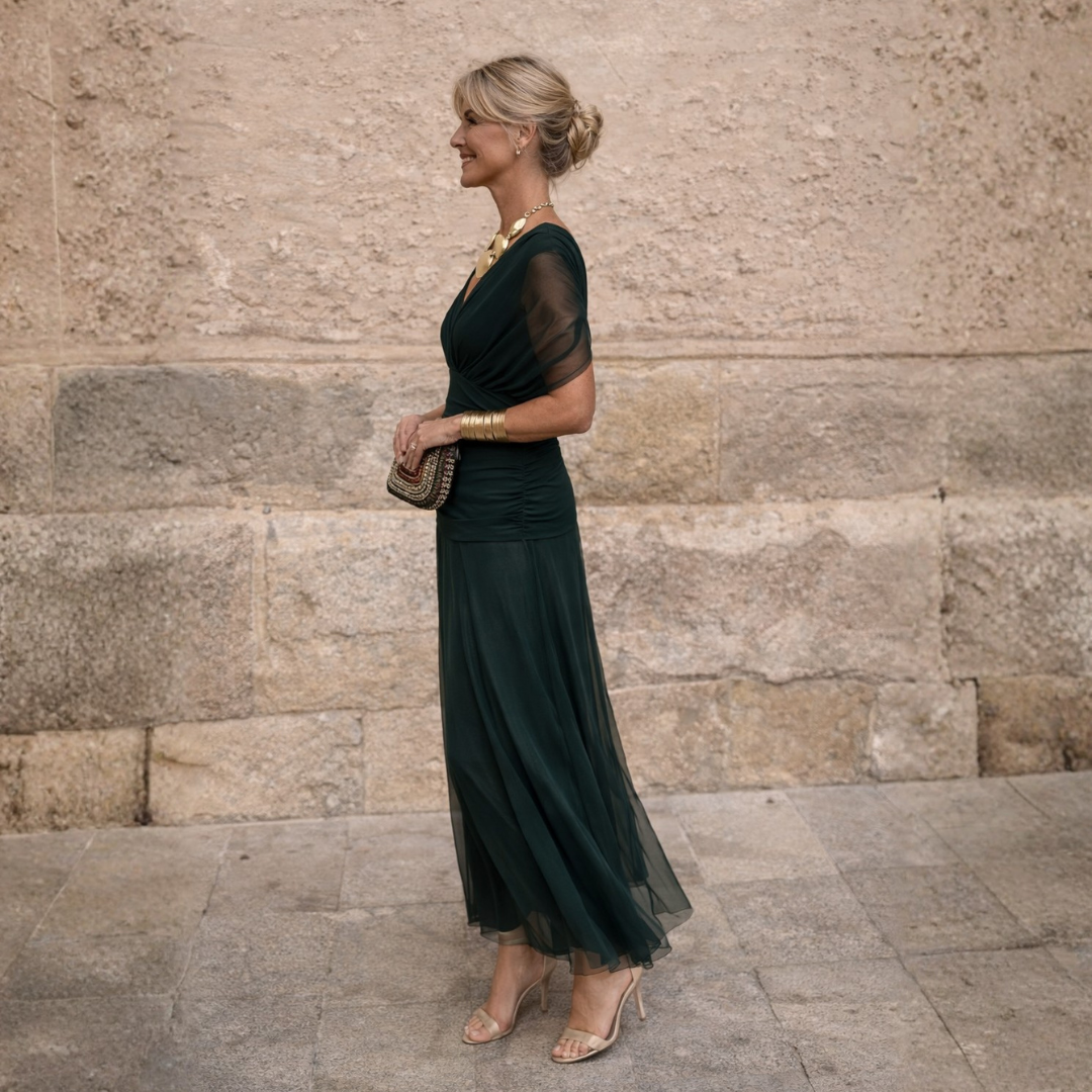 Maya maxi dress in dark green, full-length side view
