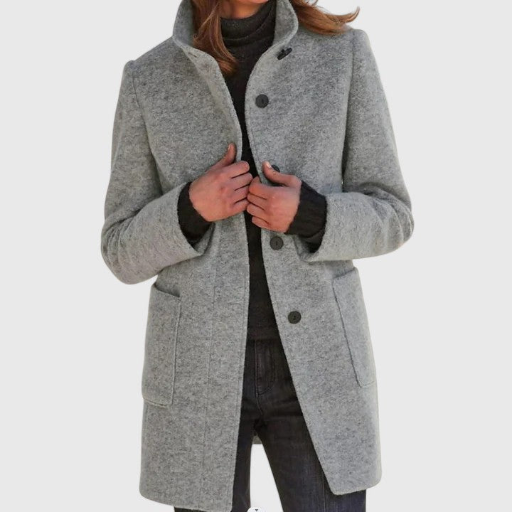 Leonora classic stand-collar coat in grey, front view held closed