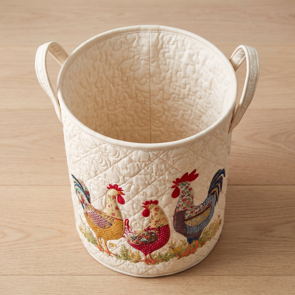 Manuela hand-quilted laundry basket with three patchwork hens, open empty view