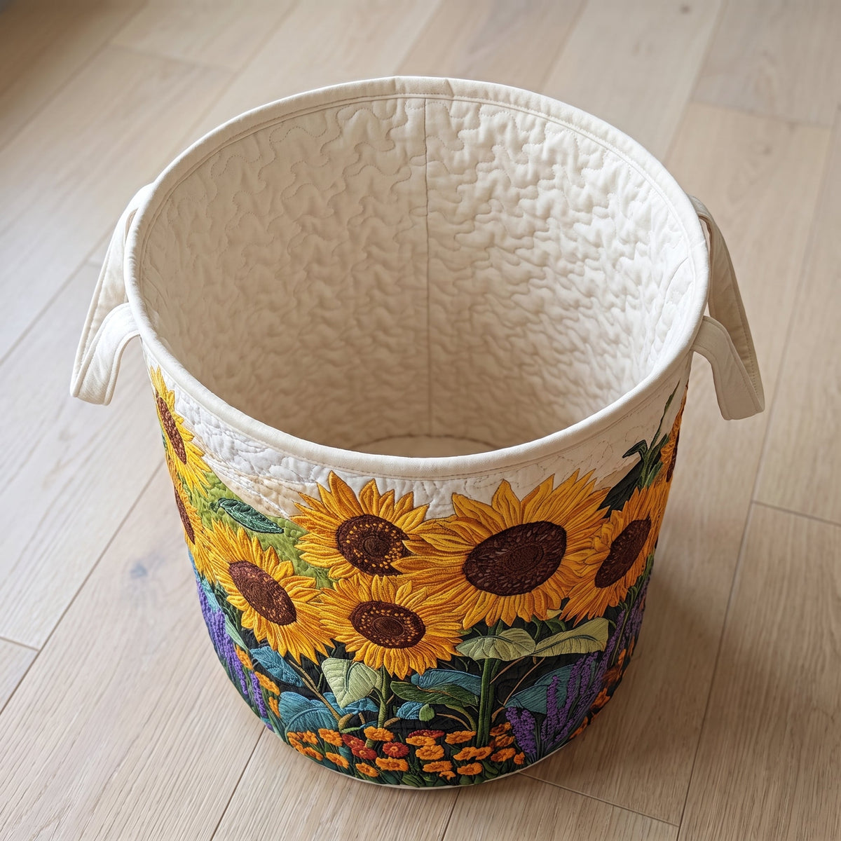 Marisa hand-quilted laundry basket with a field of sunflowers with lavender and marigolds, open empty view