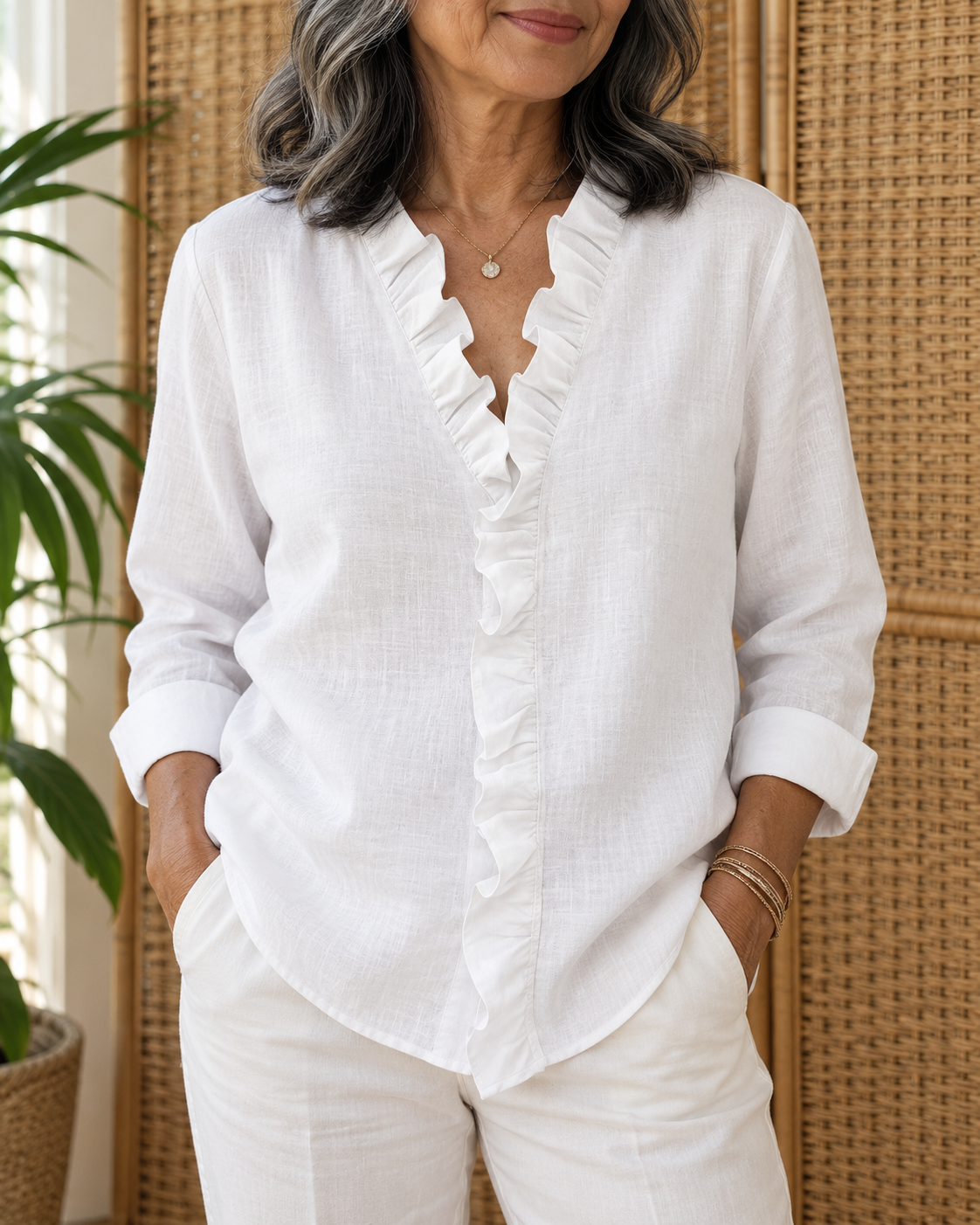 Esme ruffle V-neck linen blouse in white, front view with rolled cuffs