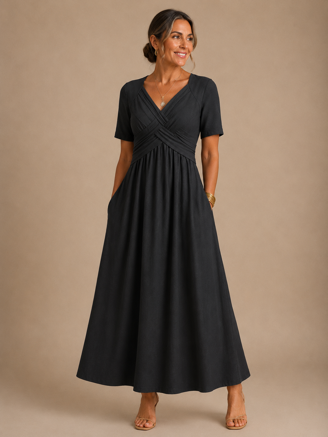 Angela crossover V-neck dress in black, full-length front view