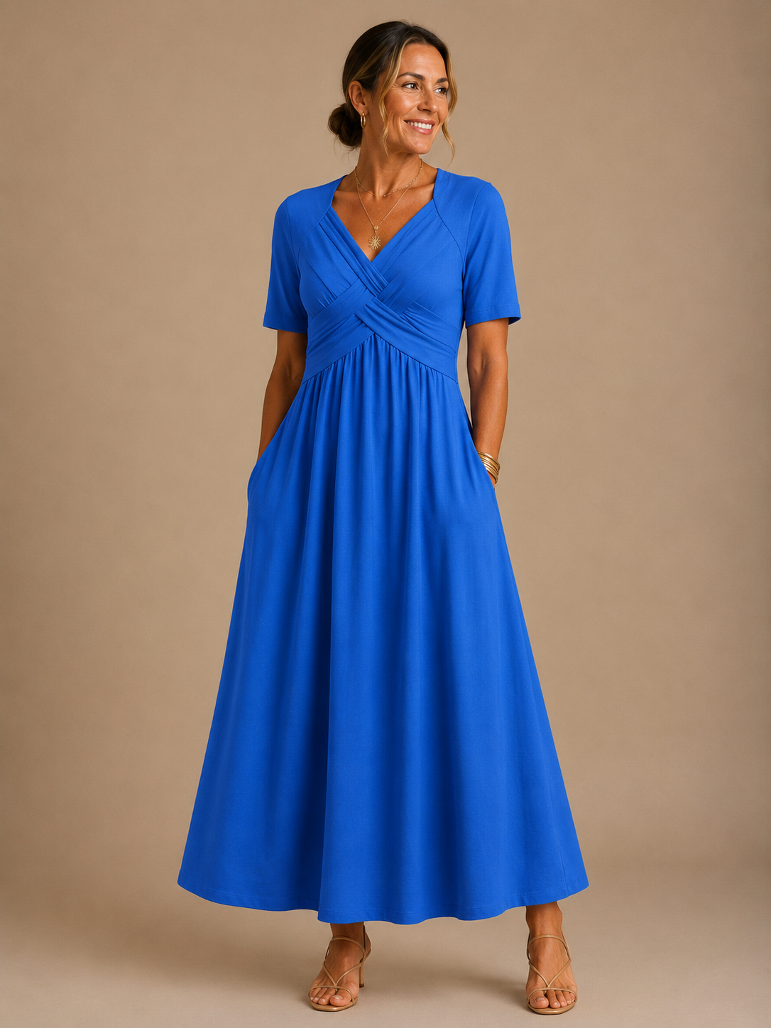 Angela crossover V-neck dress in blue, full-length front view