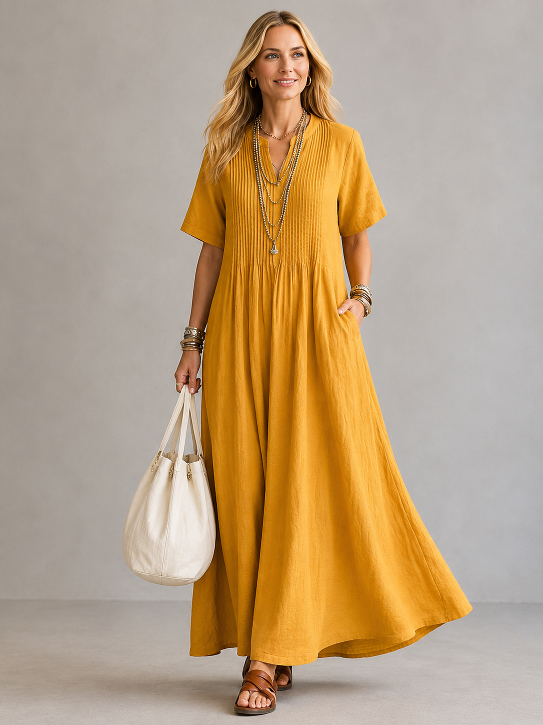 Natasha pleated maxi dress in yellow, full-length front view