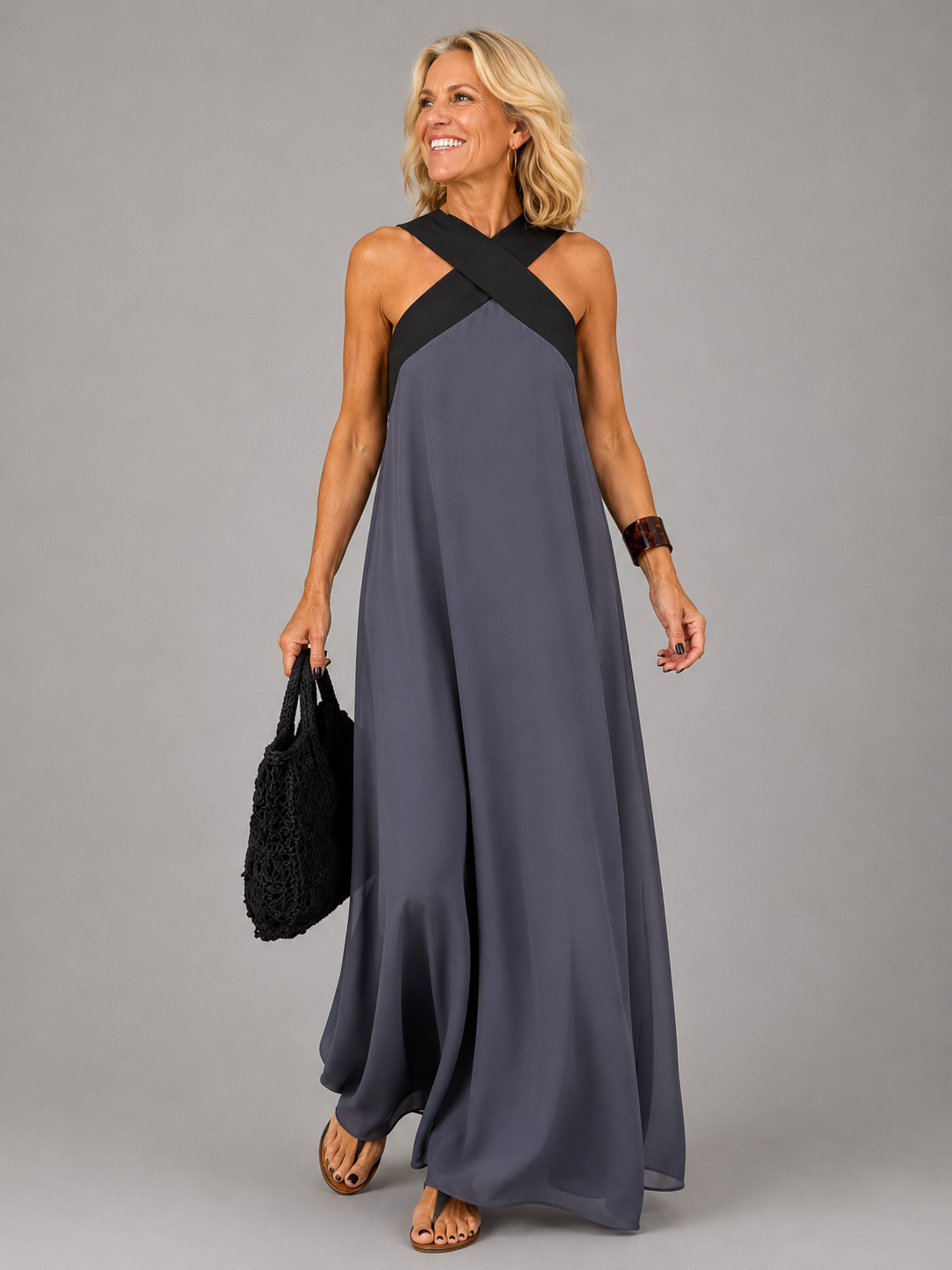 Edie halter maxi dress in grey with black neckline band, full-length front view
