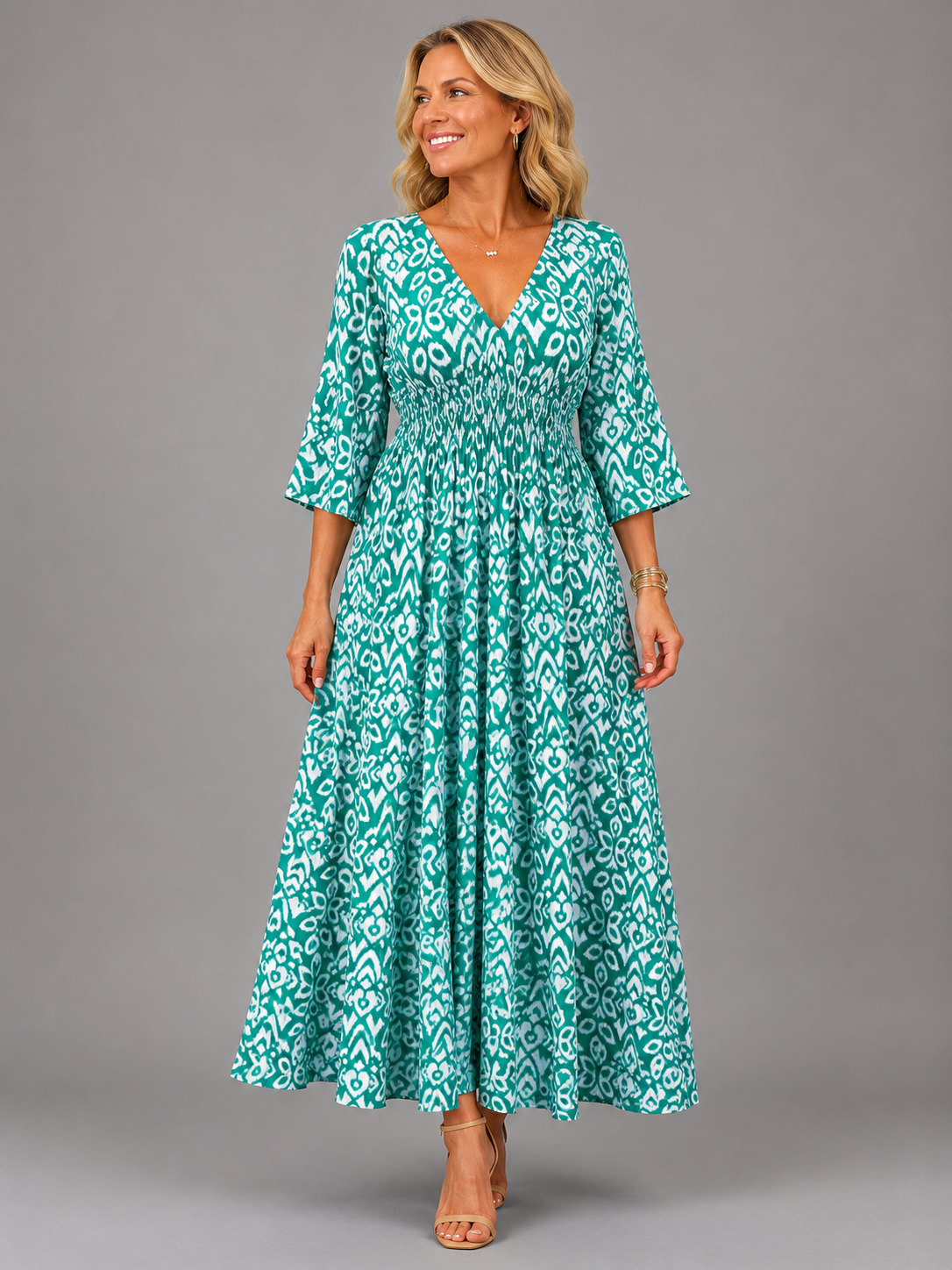 Althea smocked ikat-print midi dress in blue, full-length front view