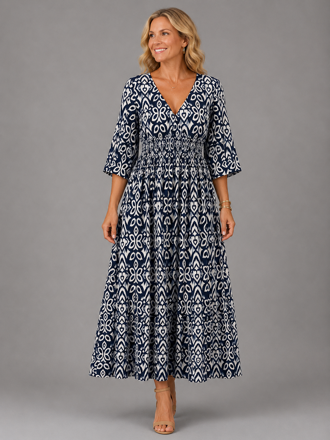 Althea smocked ikat-print midi dress in dark blue, full-length front view