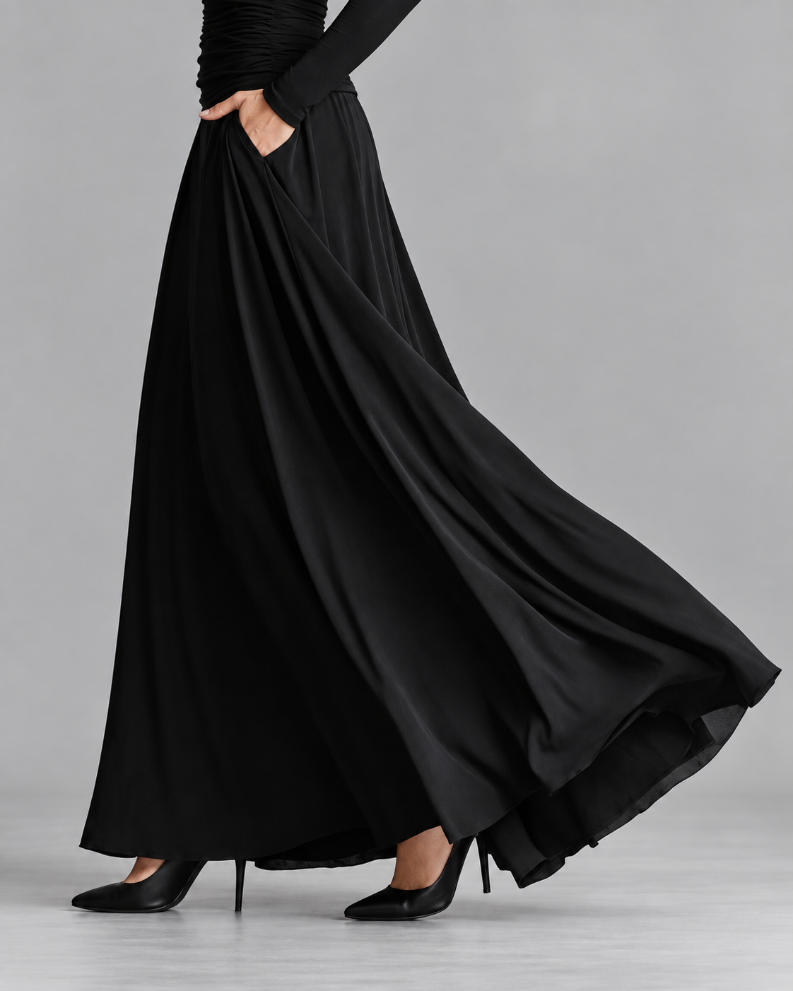 Heloise flowing maxi dress in black, skirt and pocket detail