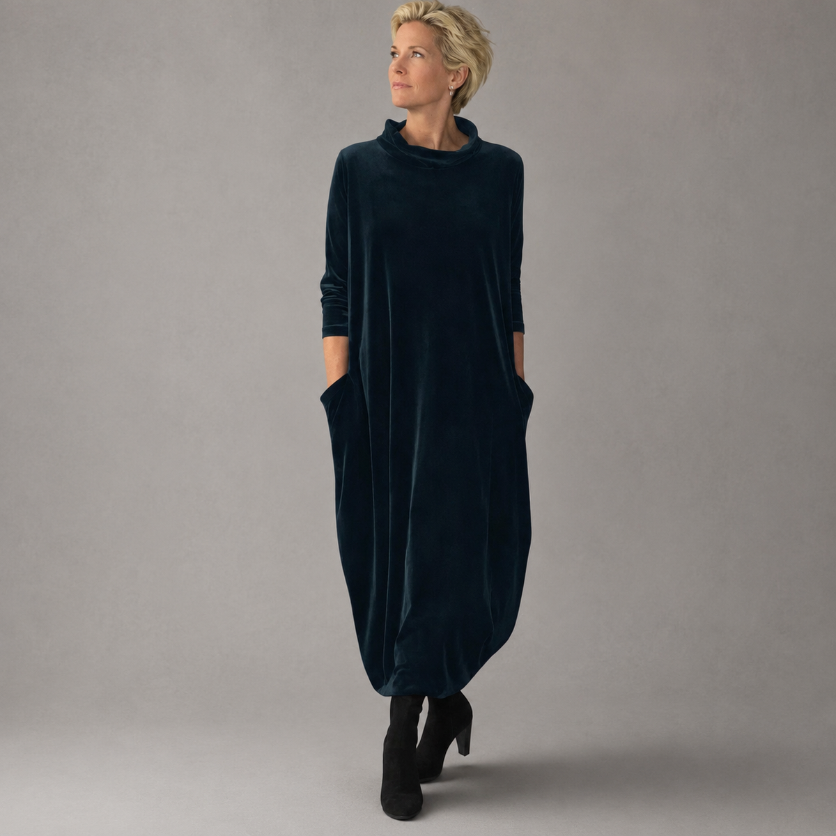 Corisande velvet cocoon maxi dress in navy, full-length front view with ankle boots