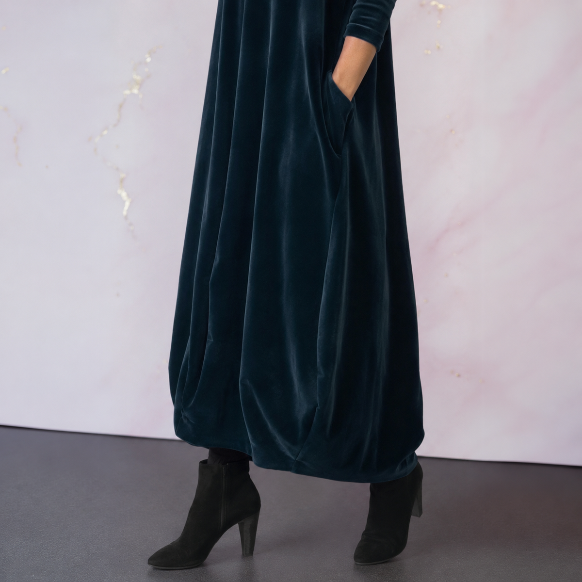 Corisande velvet cocoon maxi dress, close-up of side pocket and hem
