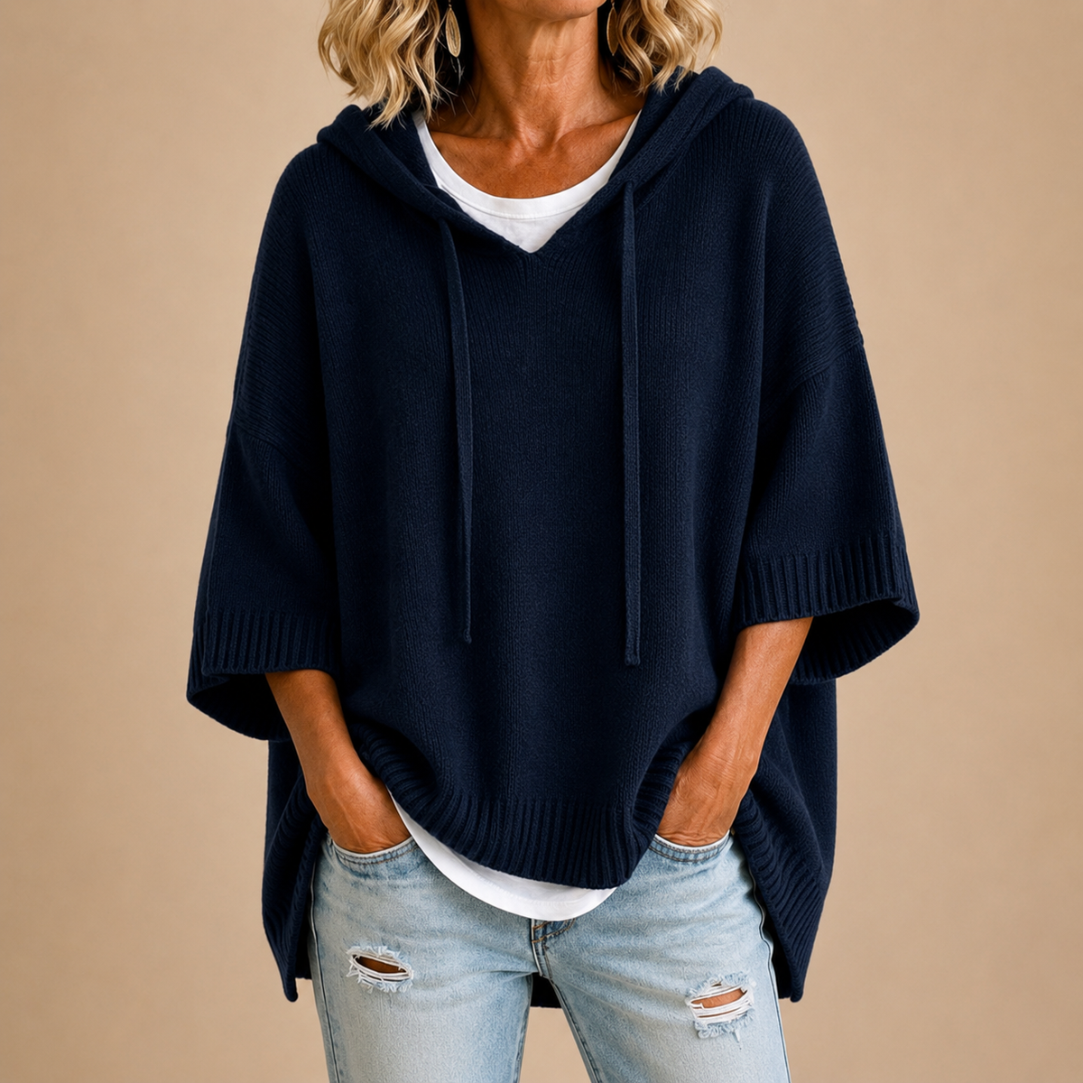 Hooded knit poncho in navy, front view