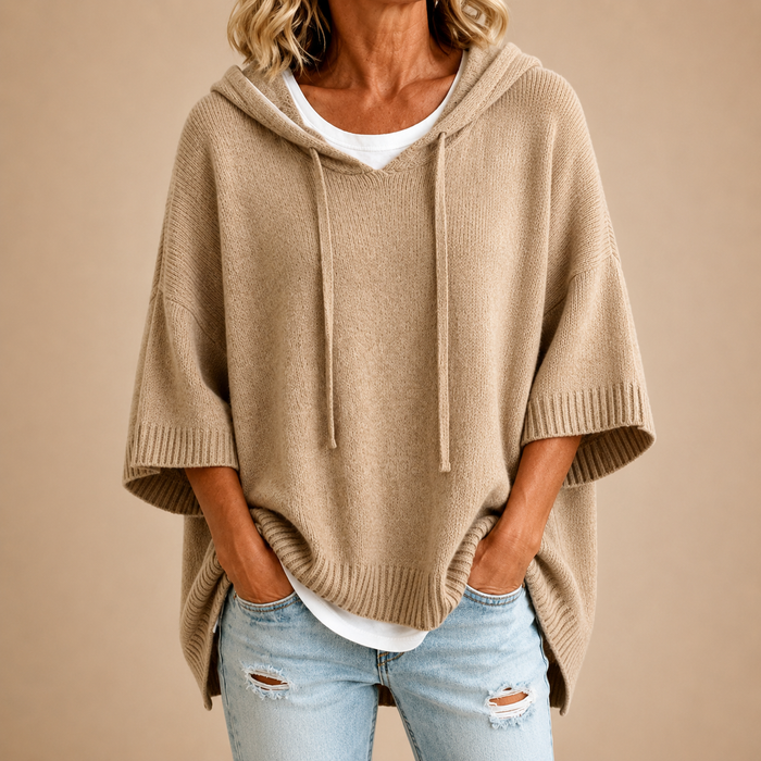 Hooded knit poncho in beige, front view