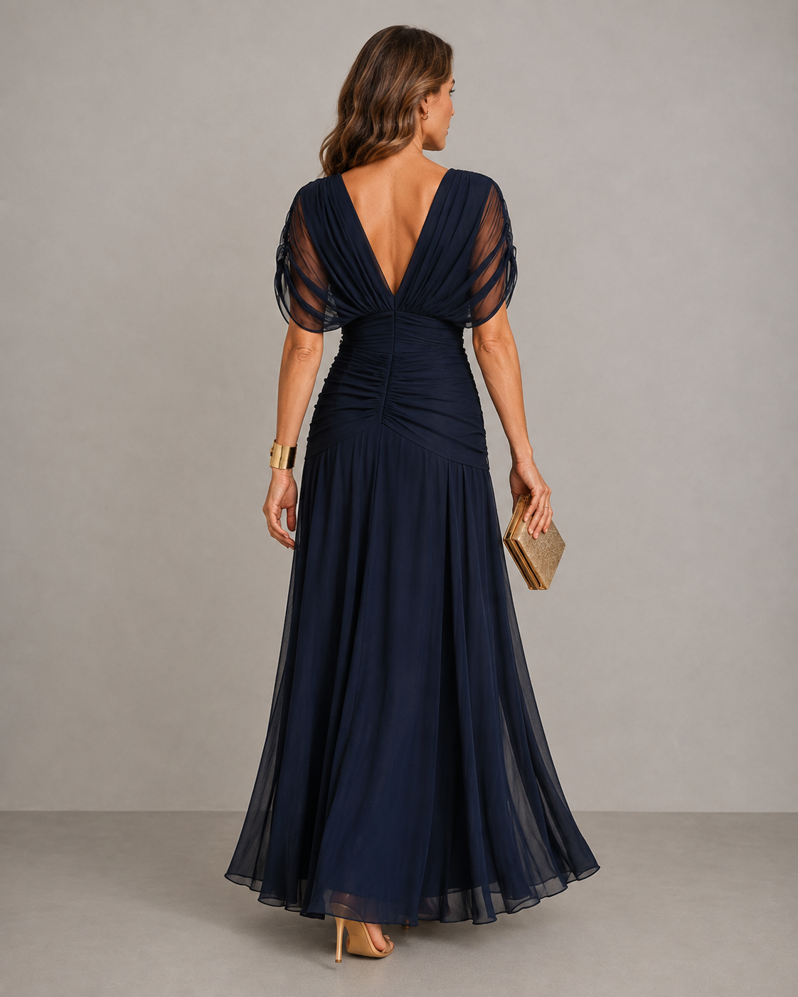 Willow pleated flowing dress in navy, back view with V-back