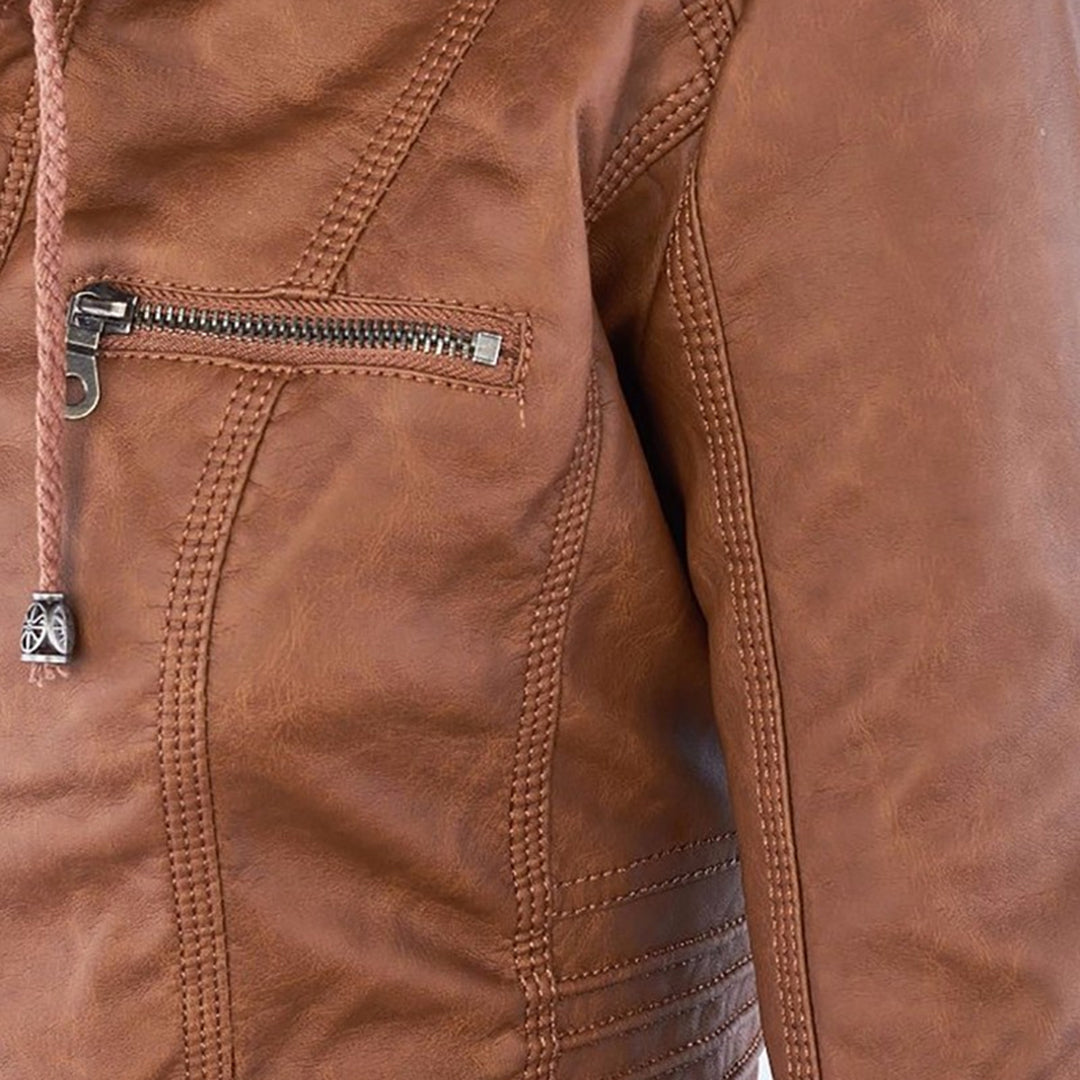 Cynthia hooded biker jacket in tan, close-up of zip chest pocket and stitching
