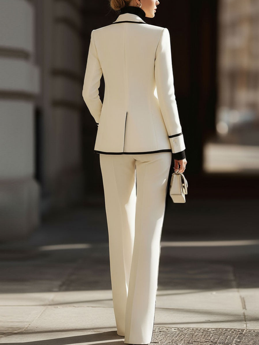 Rosamund trouser suit in ivory, full-length back view with blazer vent