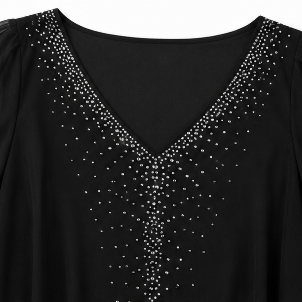 Jessamy embellished overlay dress in black, close-up of embellished V-neckline