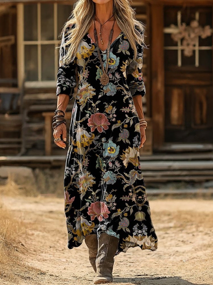 Nerine floral maxi dress in black, walking view