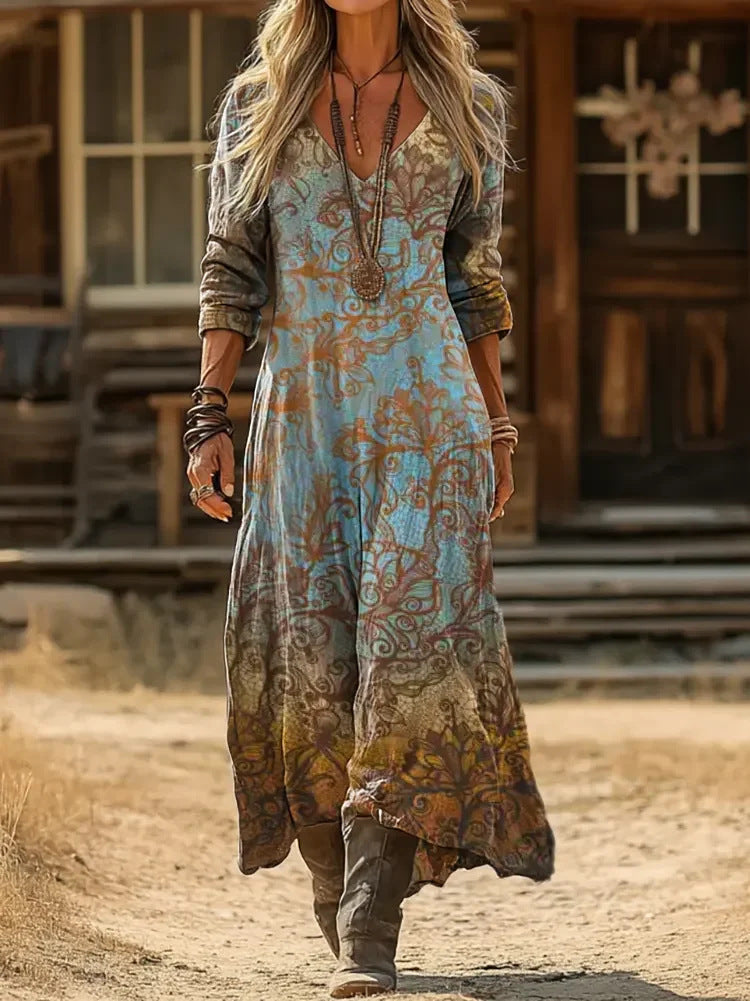 Orlaith paisley maxi dress in blue and brown, walking view