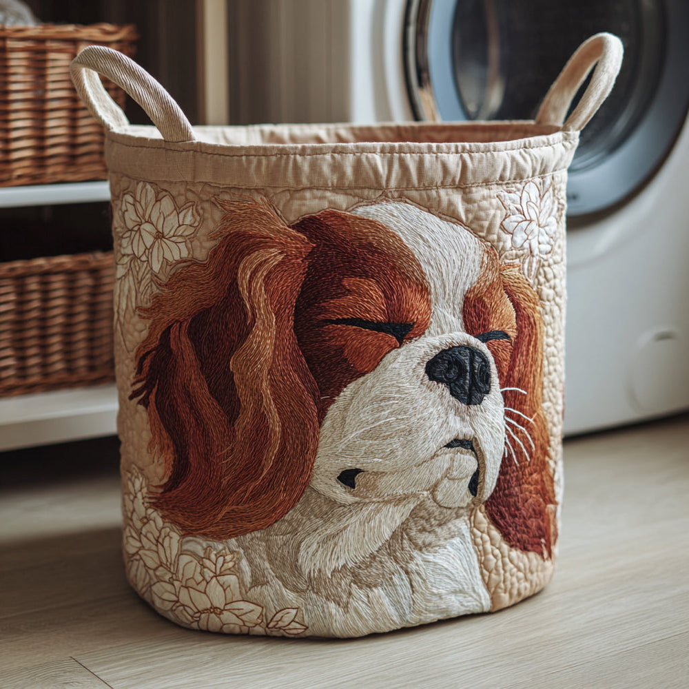 Miranda hand-quilted laundry basket with a sleeping Cavalier King Charles spaniel, front view