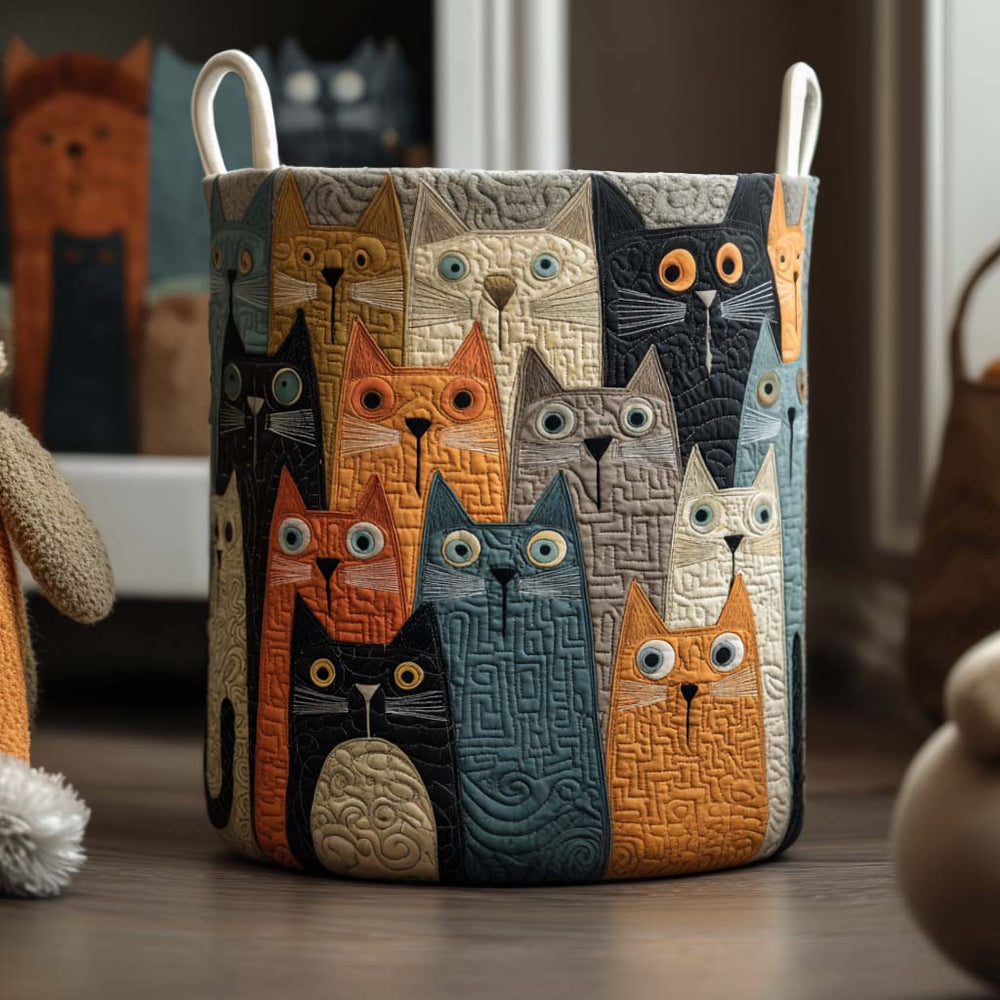 Rosanna hand-quilted laundry basket with a crowd of wide-eyed stylised cats, front view in a utility room