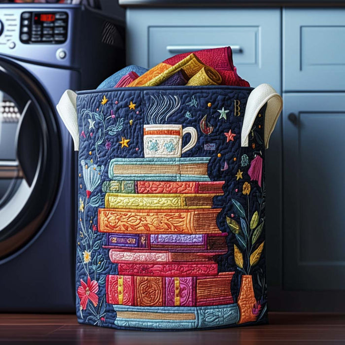 Ludovica hand-quilted laundry basket with a colourful stack of books and a teacup, front view