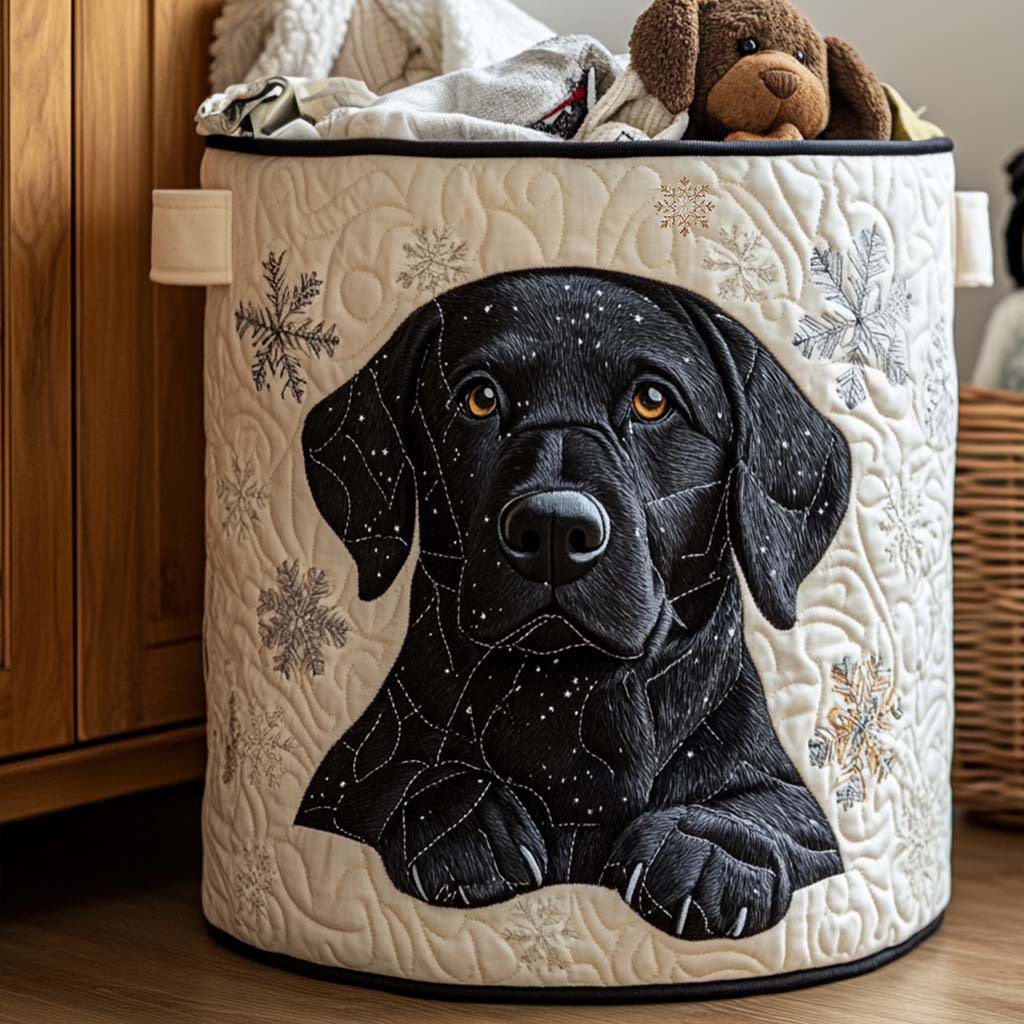 Velia hand-quilted laundry basket with a black Labrador surrounded by soft snowflakes, front view