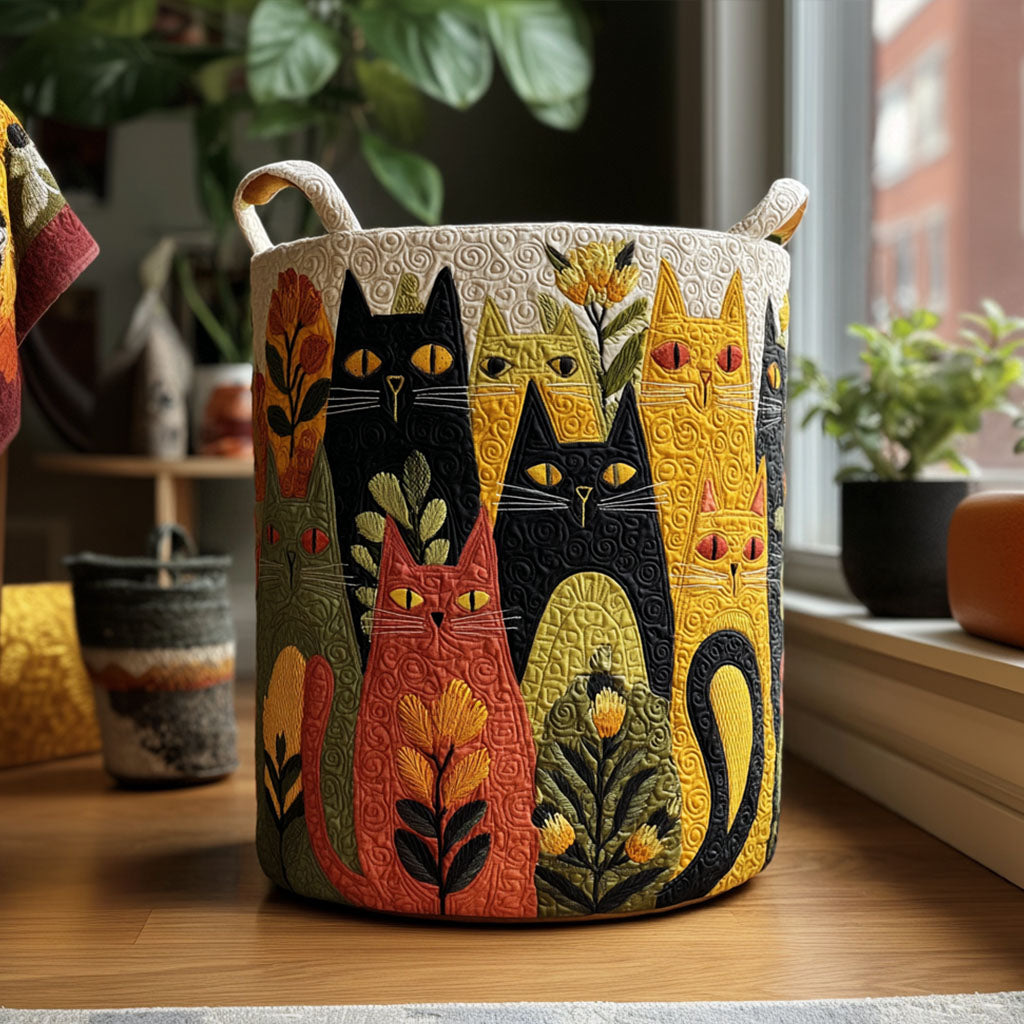 Simona hand-quilted laundry basket with folk art cats in black, mustard and red, front view by a window