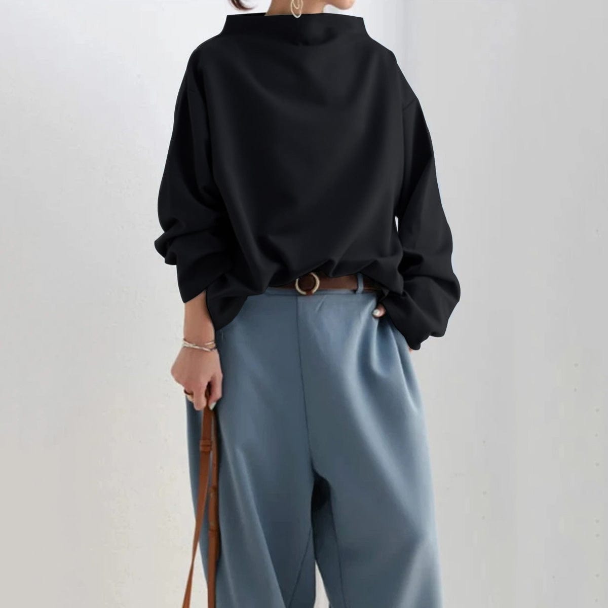 Elly funnel-neck relaxed top in black, full outfit view