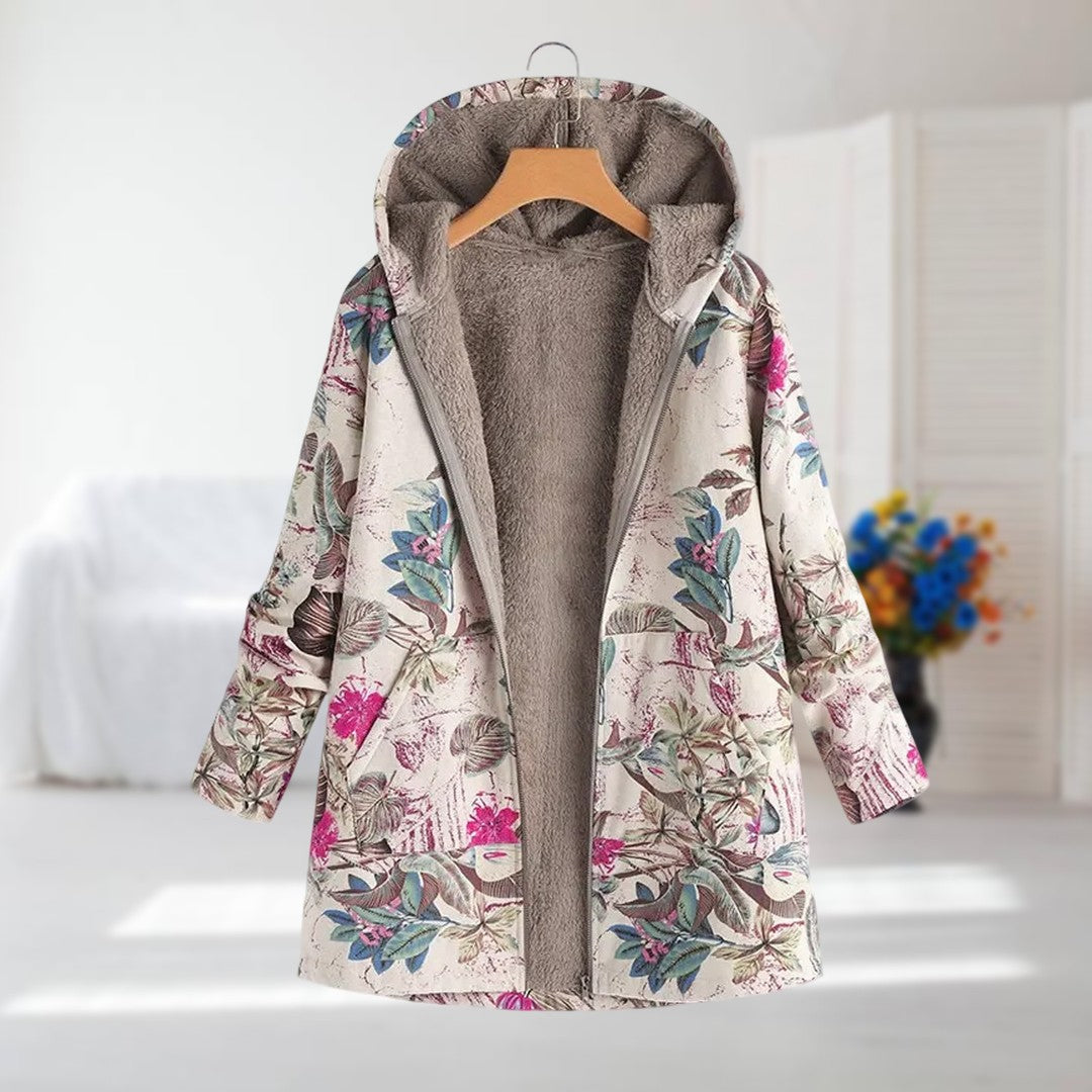 Flora hooded floral print coat in cream with pink flowers, front view on a hanger