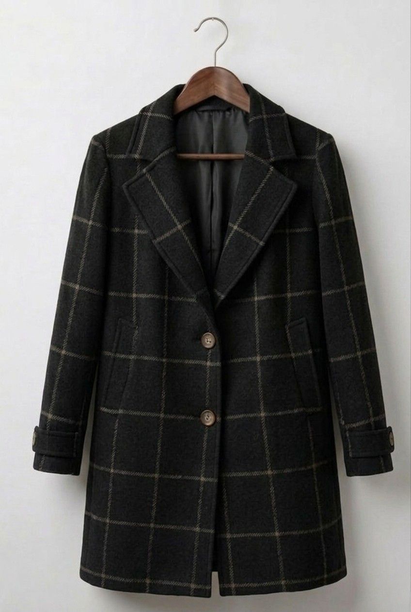 Mathilda long tweed-look check coat in black on a hanger, front view