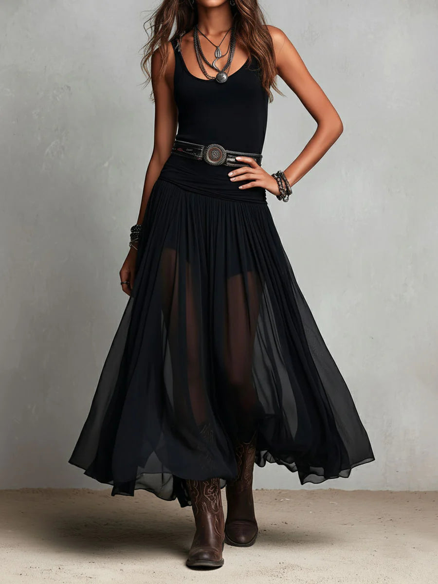 Caradee sleeveless maxi dress with tulle skirt in black, front view with hand on hip