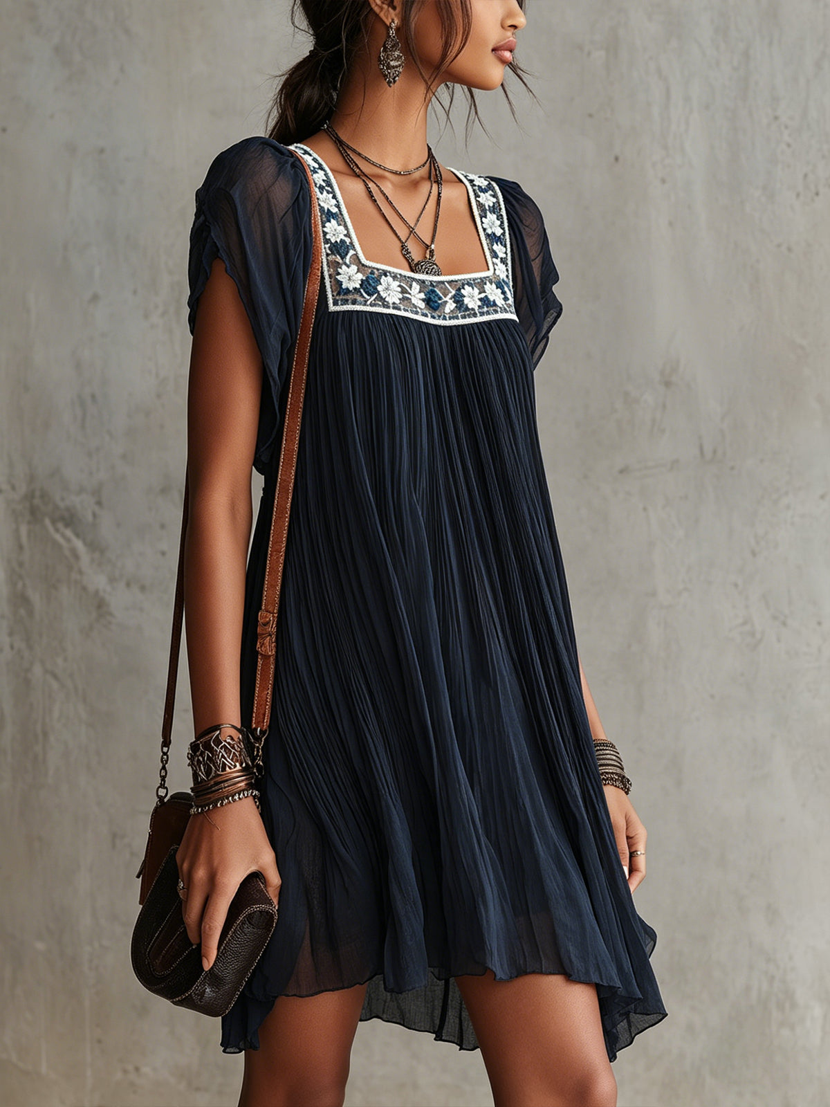 APOLLINE | NAVY FLORAL-EMBROIDERED PLEATED MINI DRESS