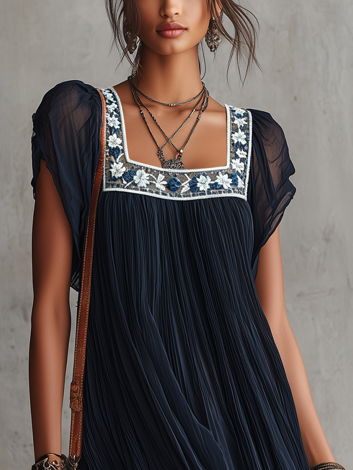 APOLLINE | NAVY FLORAL-EMBROIDERED PLEATED MINI DRESS